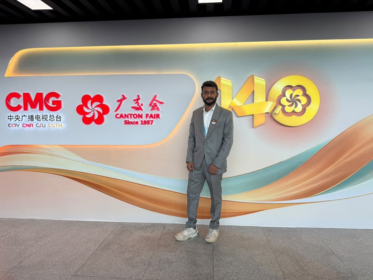 Bollam Rishithej in front of the 140th Canton Fair backdrop in Guangzhou